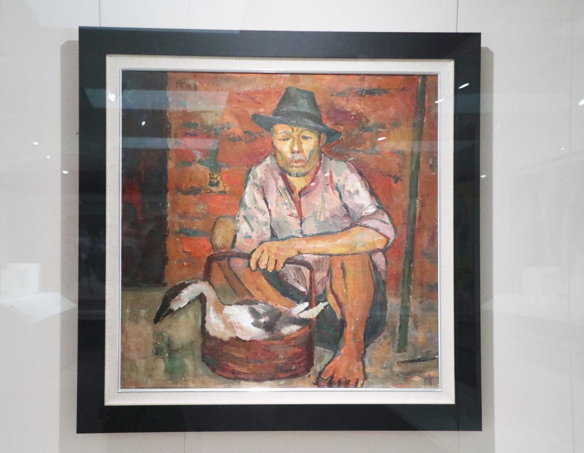 《文物默默．歷史MURMUR－典藏臺灣美術作品修護展》呈現史博館修護的臺灣美術作品，包含，席德進《賣鵝者》等畫作。（記者劉昕翊攝）